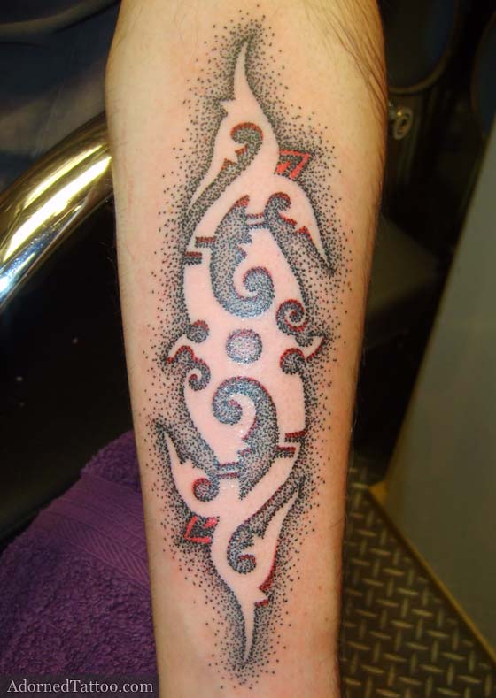 To make this Borneoinspired tribal tattoo a bit different 