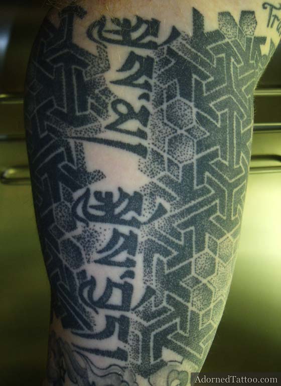 dotwork geometric pattern and Sanskrit inner arm tattoo