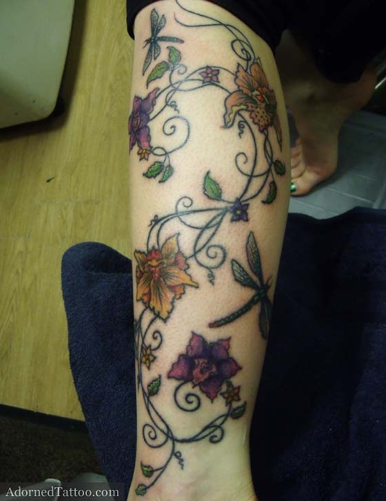 orchids and dragonflies calf tattoo