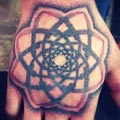 Geometric pattern Mandela hand tattoo