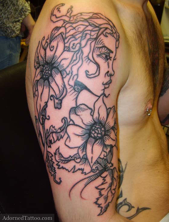 This tattoo is based on a drawing by Brandon Boyd of the popular beat combo 