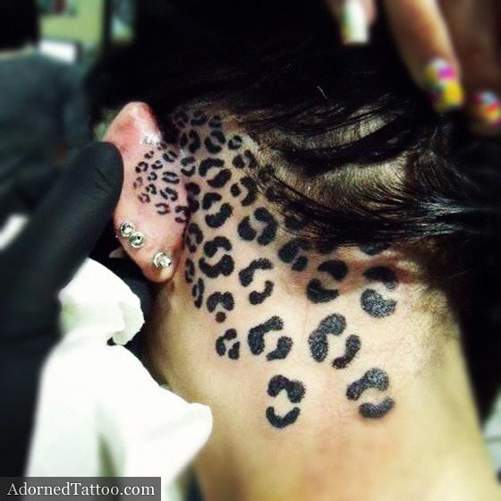 dotwork leopard-print neck tattoo