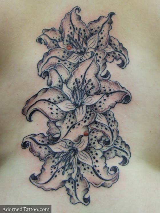 lilies back tattoo