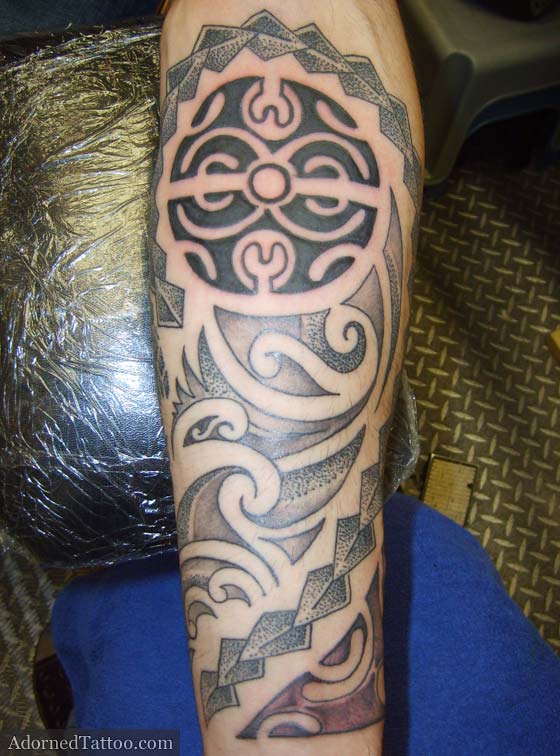Maori and Tahitianstyle forearm tribal tattoo