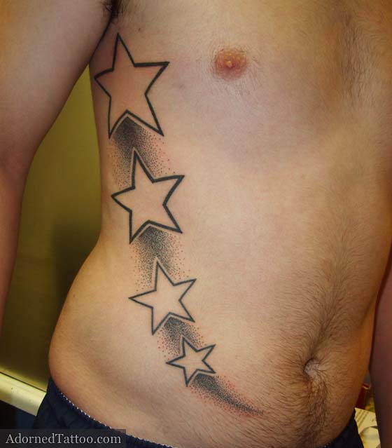 Shooting Stars Rib Cage Tattoo | Adorned Tattoo