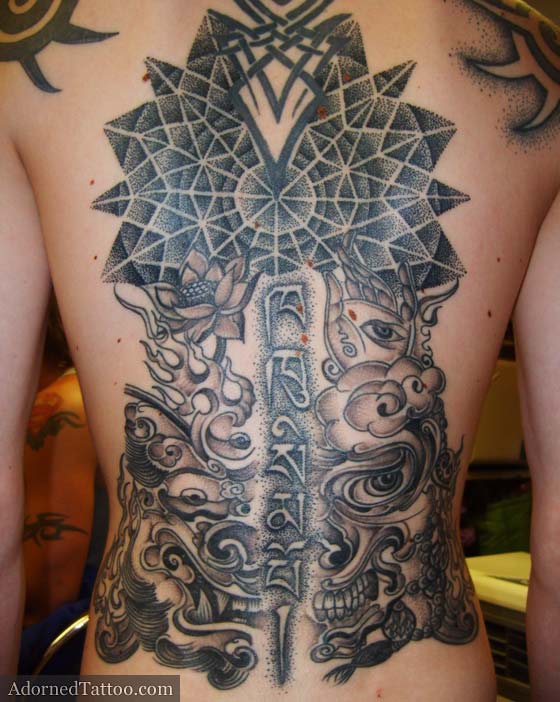 Tibetan back tattoo with geometric dotwork circle Tibetan back tattoo