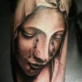 Virgin Mary tattoo