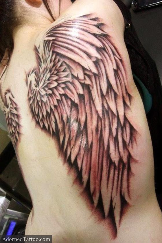 black and grey wings back tattoo