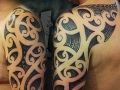 Polynesian shoulder tattoo by Alex