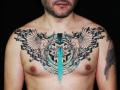 geometric dotwork chest tattoo by Alex