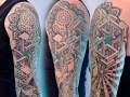 geometric dotwork sleeve tattoo by Alex