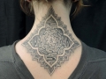 geometric dotwork neck tattoo by Alex