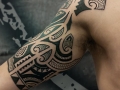 Polynesian upper arm tattoo by Alex