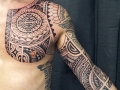 Samoan chest and sleeve tattoo by Alex