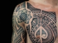 Samoan chest and sleeve tattoo by Alex