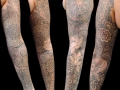 geometric sleeve tattoo by Alex