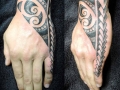 Polynesian hand tattoo by Alex