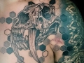 skull chest tattoo by Alex